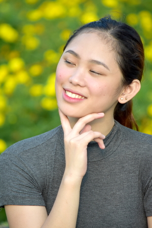 Attractive Asian Female Making A Decisionの写真素材