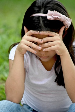 Sad Petite Filipina Girlの写真素材