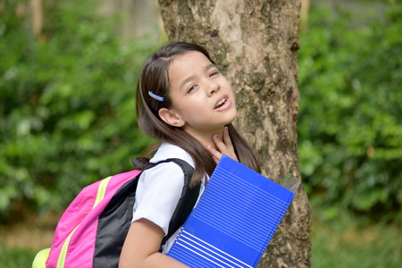 Unhappy Prep Filipina Girl Studentの写真素材