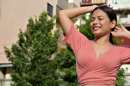 Youthful Filipina Adult Female Wonderingの写真素材