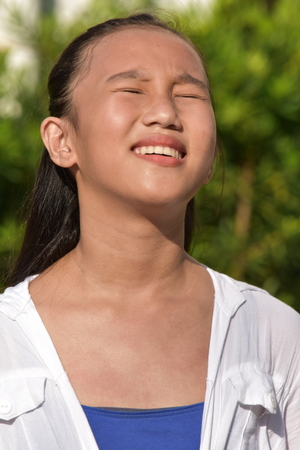 Stressful Youthful Asian Femaleの写真素材