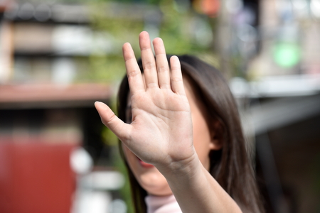 A Woman Gesturing Stopの写真素材