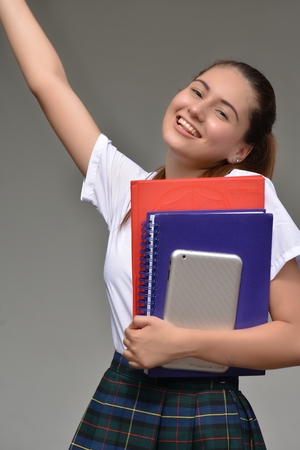 Successful Catholic Colombian Student Teenager School Girl Wearing School Uniformの写真素材