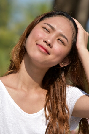 Beautiful Filipina Female Wonderingの写真素材
