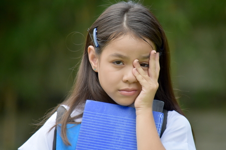 Bashful School Girl Wearing School Uniformの写真素材