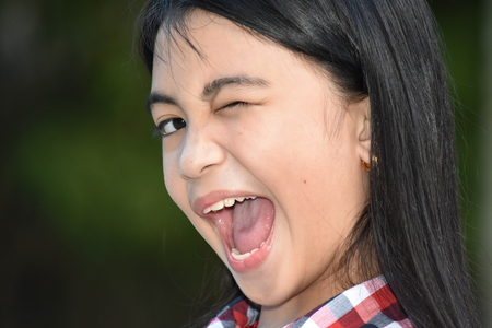 Winking Pretty Diverse Femaleの写真素材