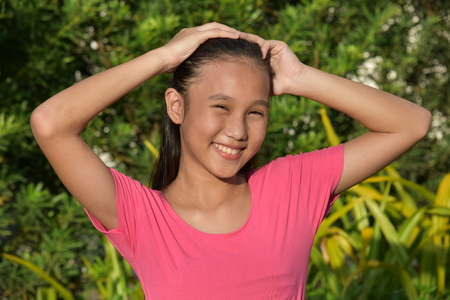 Forgetful Youthful Filipina Personの写真素材