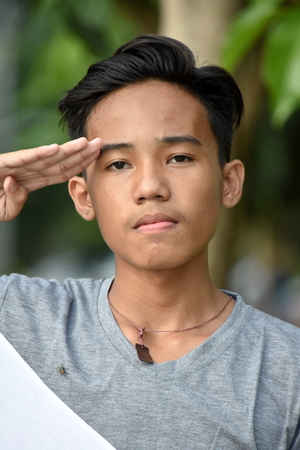Good Looking Diverse Male Salutingの写真素材