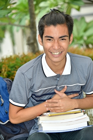Diverse Boy Student And Laughterの写真素材