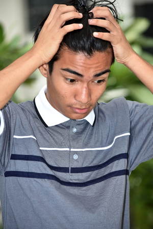 Diverse Male Under Stressの写真素材