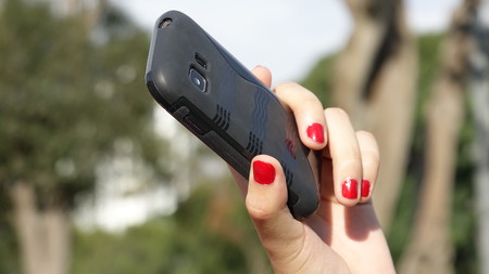 Female Hand Holding Smartphone