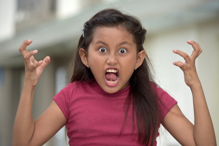 Stressed Young Asian Childの写真素材