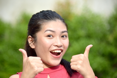 Beautiful Youth With Thumbs Upの写真素材
