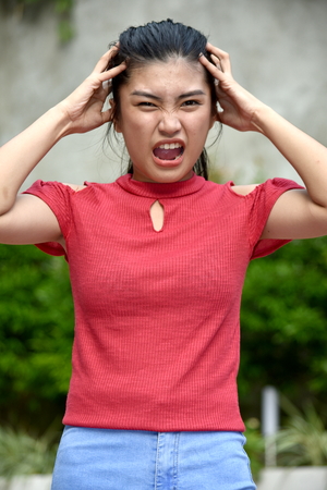 Stressed Beautiful Asian Personの写真素材
