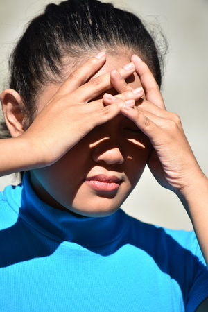 Stressful Filipina Adult Femaleの写真素材