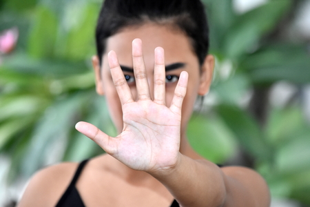 A Girl Gesturing Stopの写真素材
