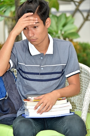 University Diverse Boy Student Under Stressの写真素材