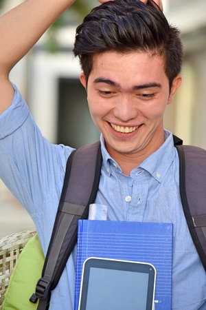 Asian Male Student And Happinessの写真素材
