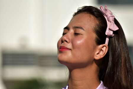 Contemplative Young Diverse Femaleの写真素材