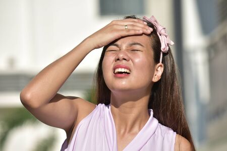 A Forgetful Asian Femaleの写真素材