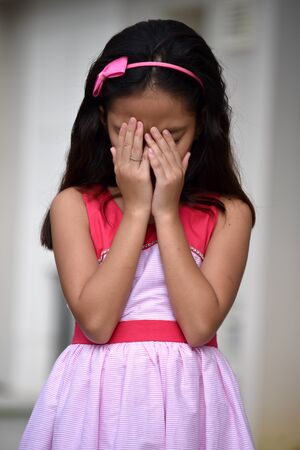 Sad Young Minority Adolescentの写真素材