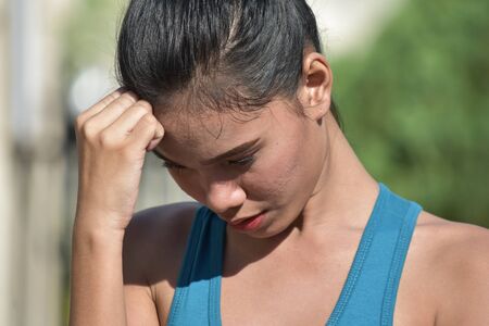 Youthful Minority Female And Sadnessの写真素材