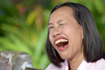 A Winking Diverse Female