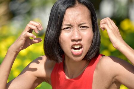 Anxious Attractive Asian Womanの写真素材