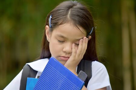 Depressed Prep Diverse Person With Booksの写真素材