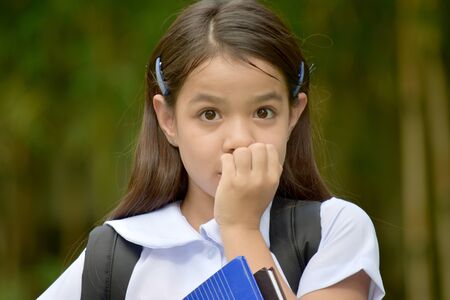 Cute Girl Student Afraidの写真素材