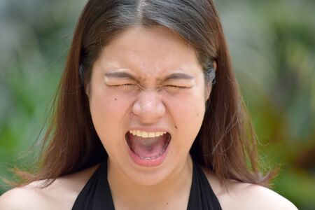 A Stressed Filipina Femaleの写真素材