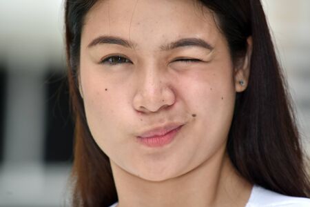 A Winking Diverse Femaleの写真素材