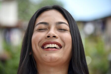 Pretty Adult Female With Eyes Closedの写真素材