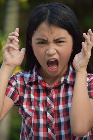 An Upset Cute Asian Personの写真素材