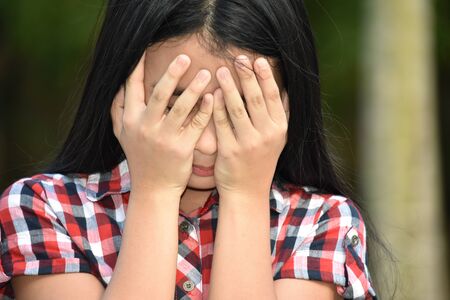 A Depressed Filipina Juvenileの写真素材