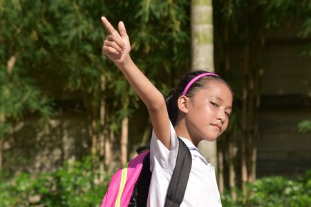 An Asian Female Student Pointing
