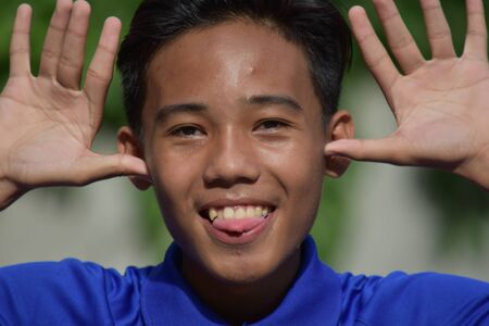 Good Looking Boy Making Funny Faces
