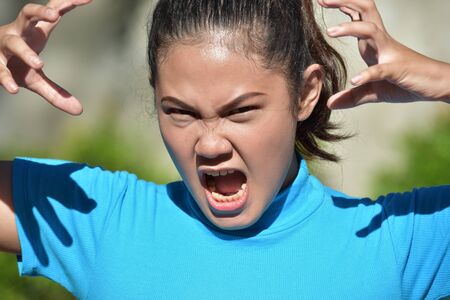 An Anxious Youthful Asian Womanの写真素材