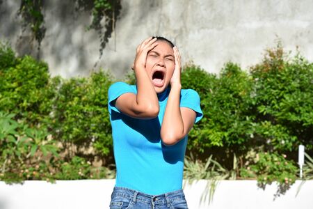 A Diverse Adult Female Under Stressの写真素材