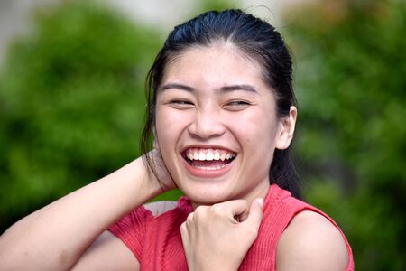 A Smiling Minority Teenage Femaleの写真素材