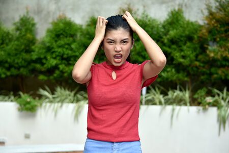 A Stressed Youthful Diverse Girlの写真素材