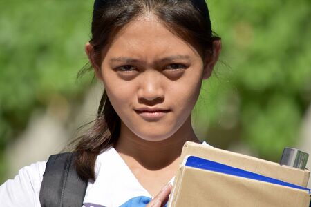 A Confused Student Teenager School Girlの写真素材