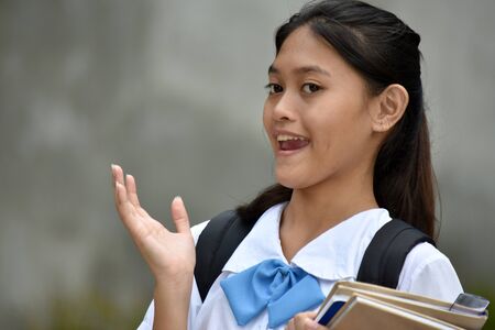 Surprised Asian Teen Student School Girlの写真素材
