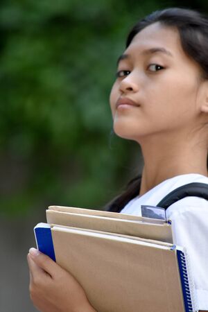 A Cute Youthful Diverse School Girl