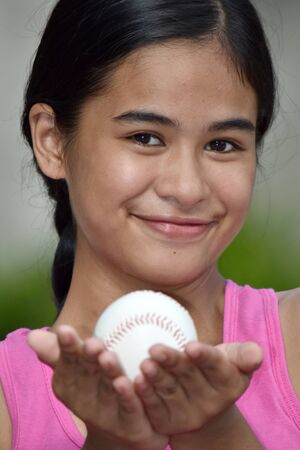 Female Athlete And Happiness With Baseballの写真素材