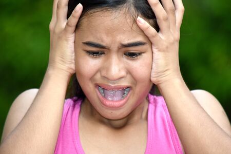 An Asian Teenage Female Under Stressの写真素材