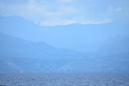 Blue Ocean Water Horizon And Cloudy Sky