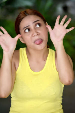 Silly Attractive Female Woman Wearing Tshirtの写真素材