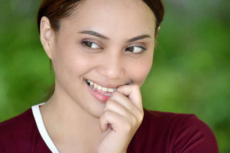 An Attractive Redhead Female Deciding