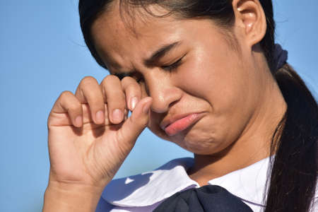 A Crying Asian Female Teenager Isolatedの写真素材